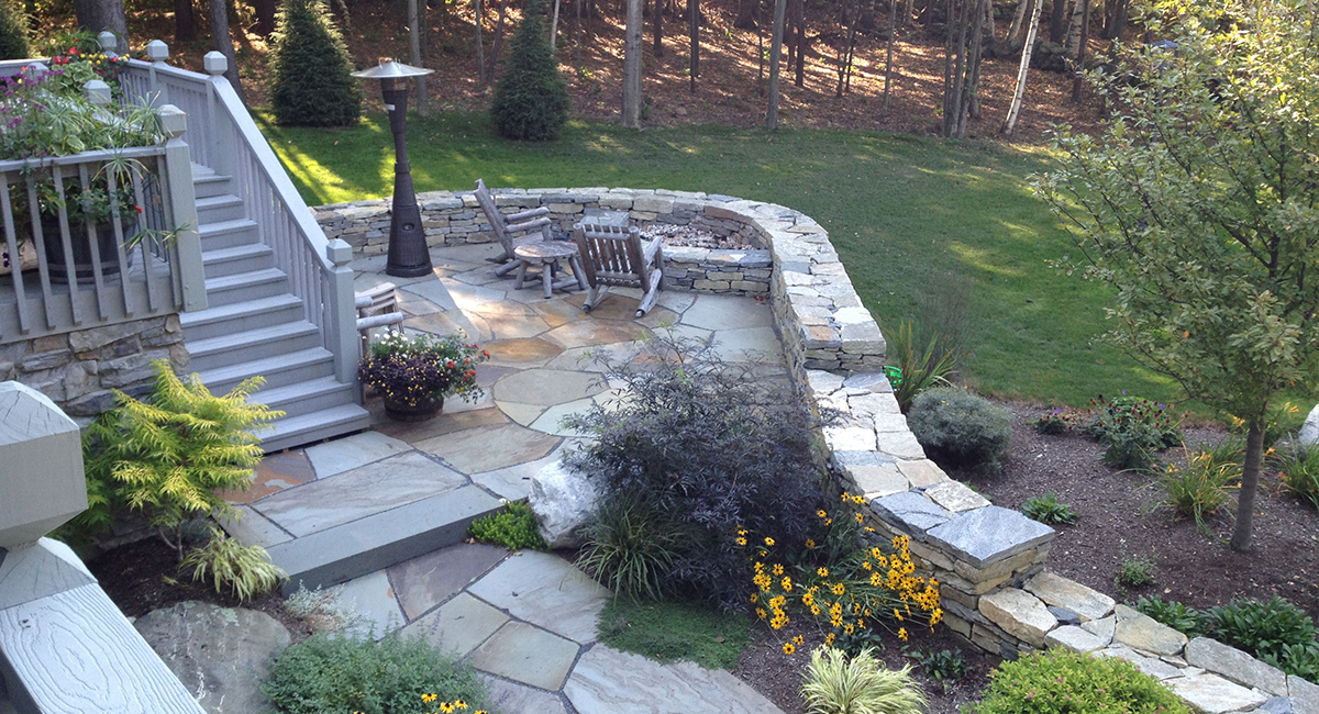 Stone walls, patio & landscape plantings